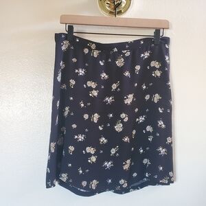 bea miniskirt reformation in Daisy Black Floral size 8